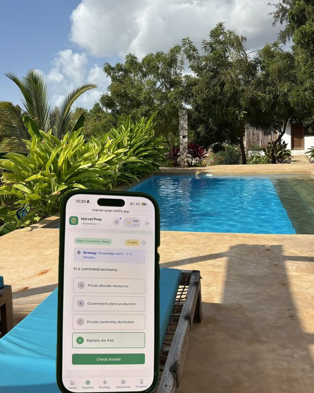 The MarvelPrep app on a phone beside a pool