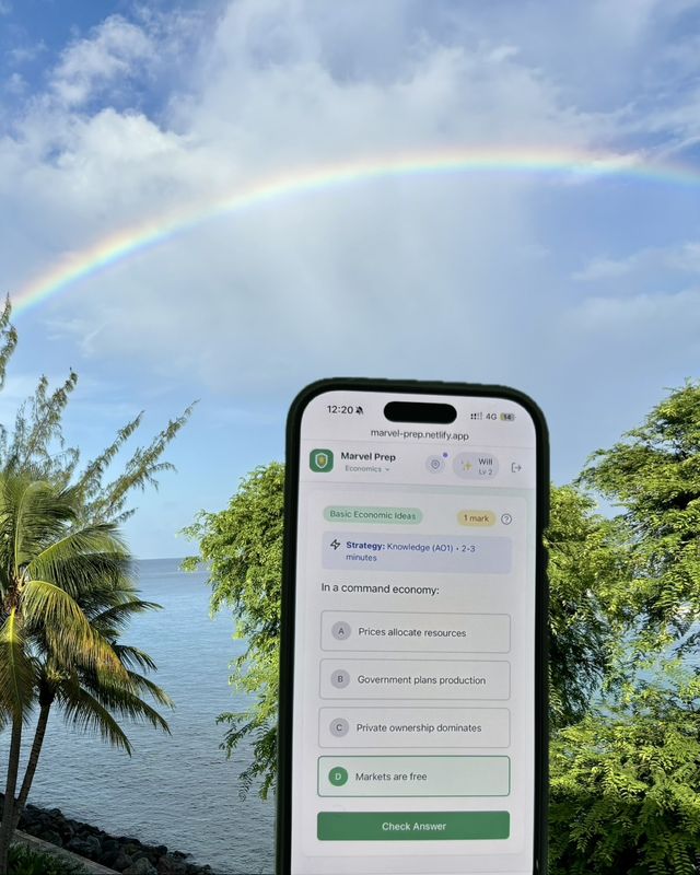 The MarvelPrep app on a phone under a rainbow over the sea